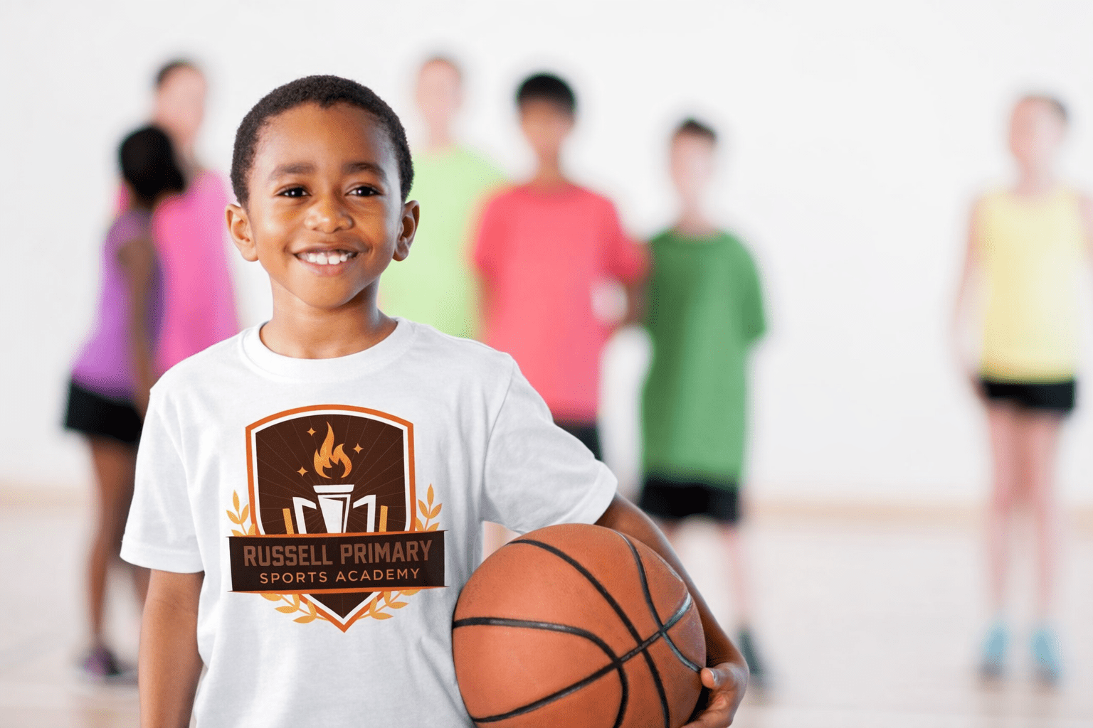 Student holding basketball in gym